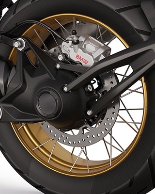 The golden cross-spoked wheels of the R 1300 GS Option 719 Tramuntana